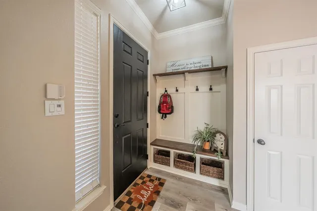 a room with rack and white walls