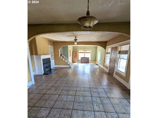 a view of an empty room and window