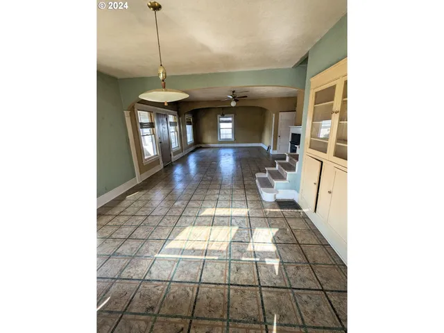 a view of a kitchen with a sink
