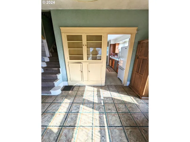 a picture of a bathroom with a sink and a mirror