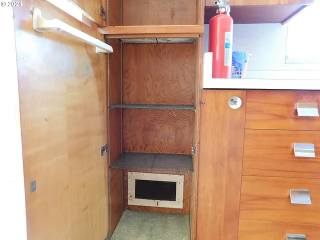 a room with storage and utility