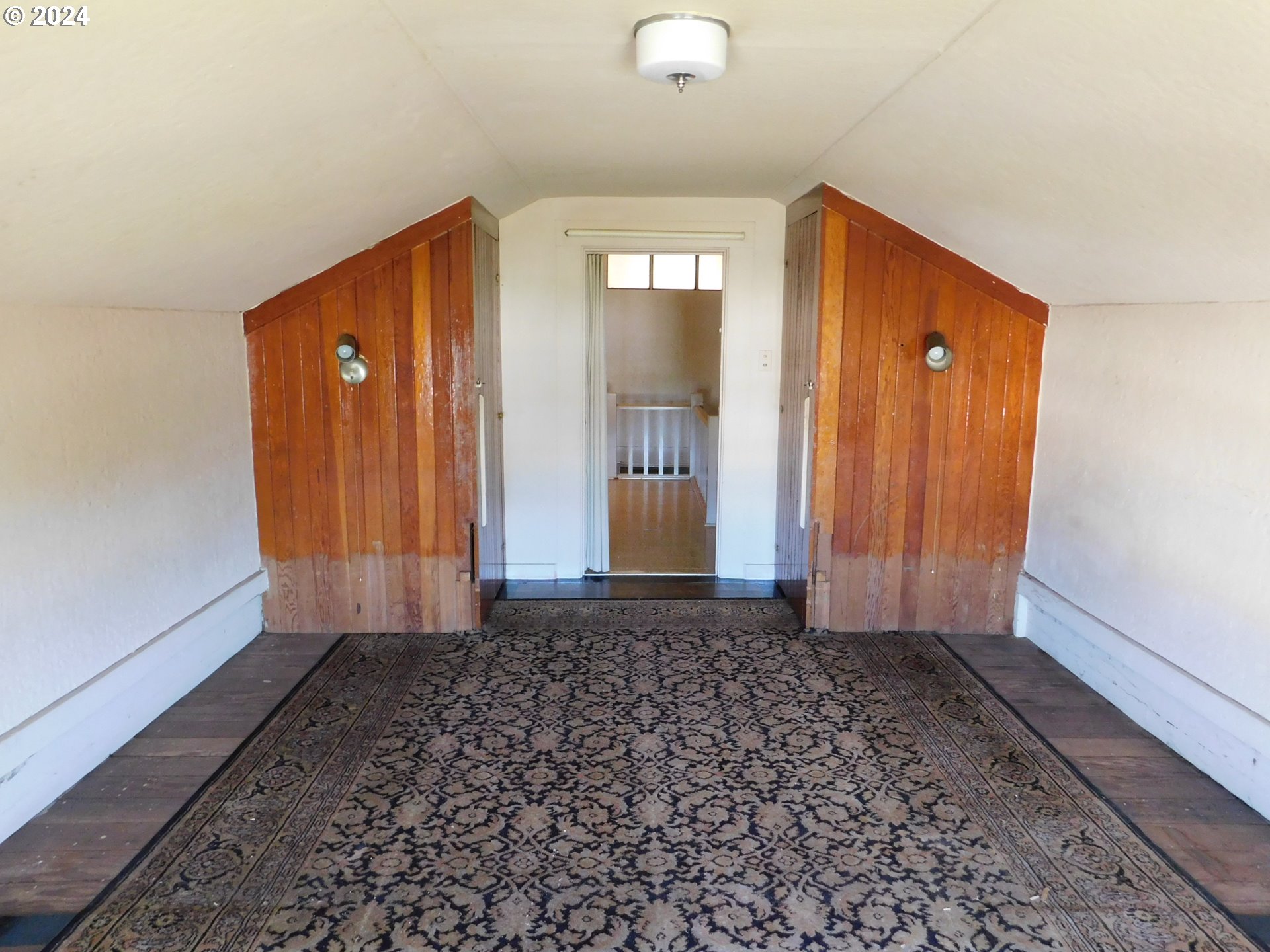 150 North Dean Street Coquille, OR 97423 - Photo 39 of 47 a view of a hallway with wooden floor