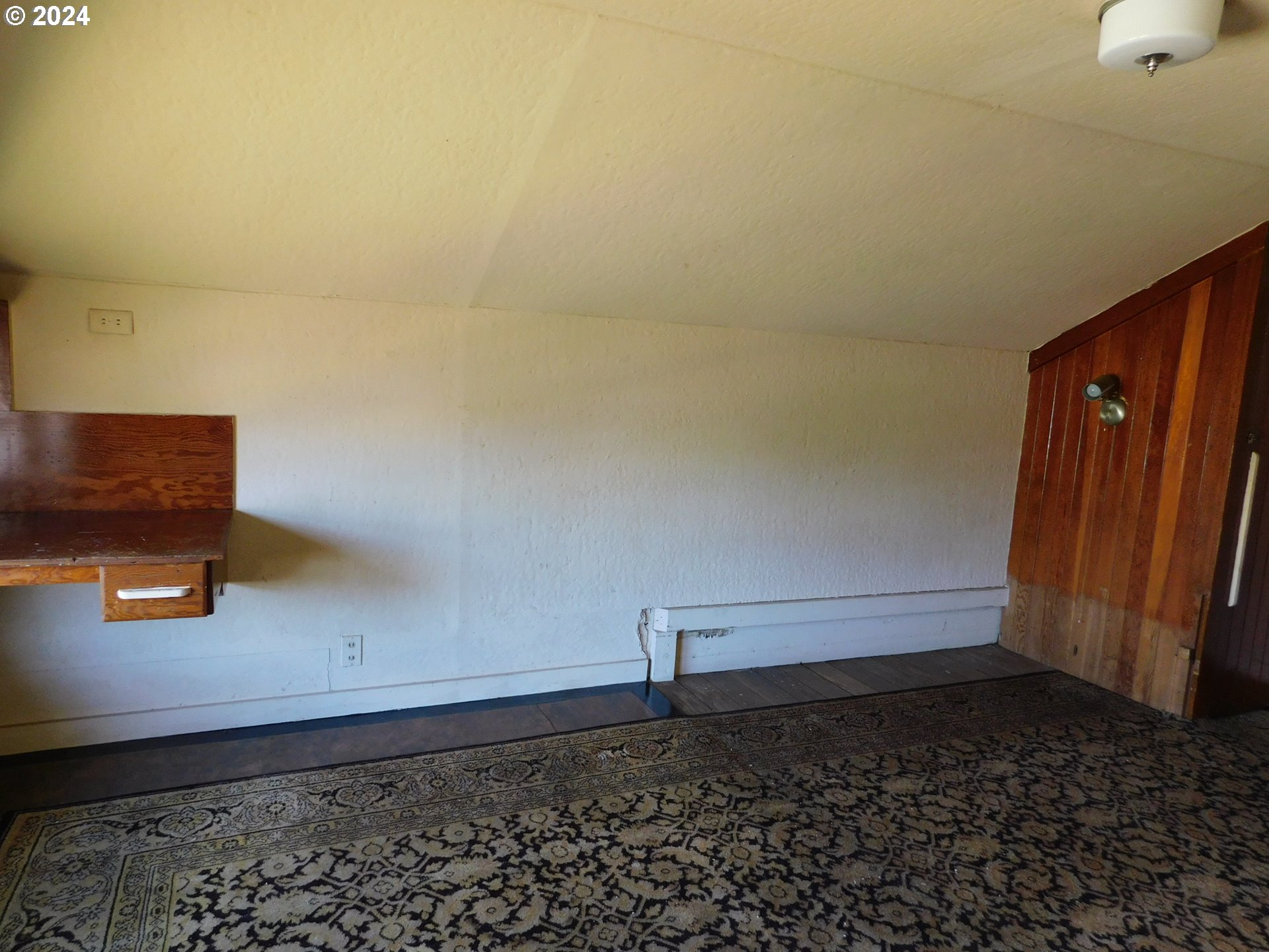 150 North Dean Street Coquille, OR 97423 - Photo 40 of 47 a view of a room with wooden floor
