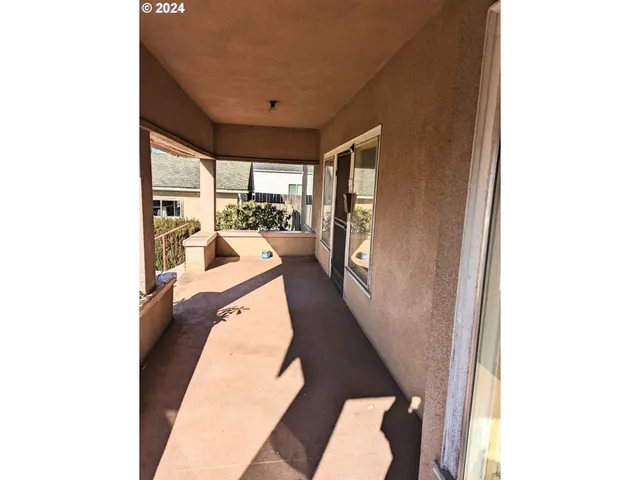 a hallway with a large window