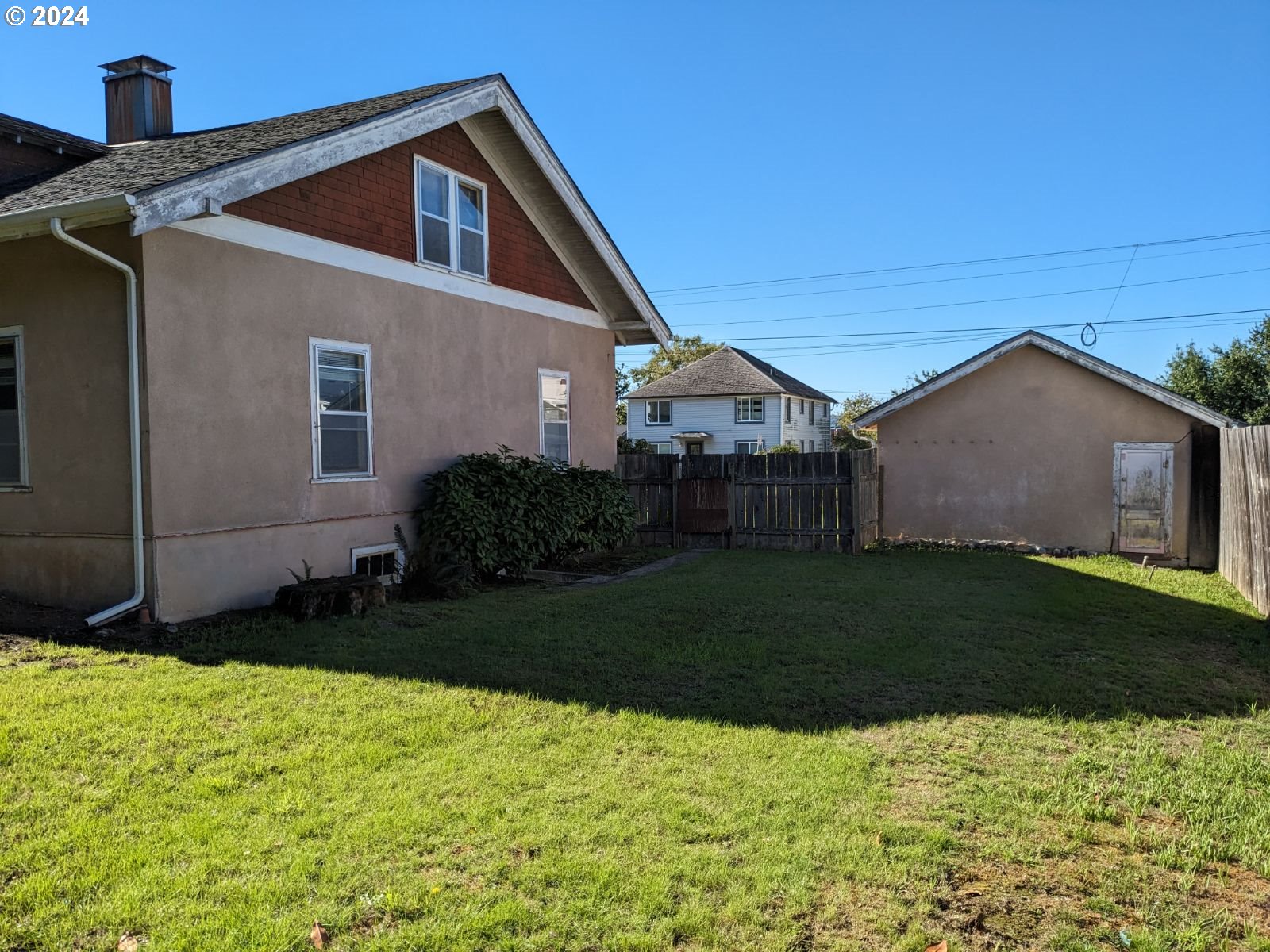 150 North Dean Street Coquille, OR 97423 - Photo 7 of 47 a front view of a house with a yard