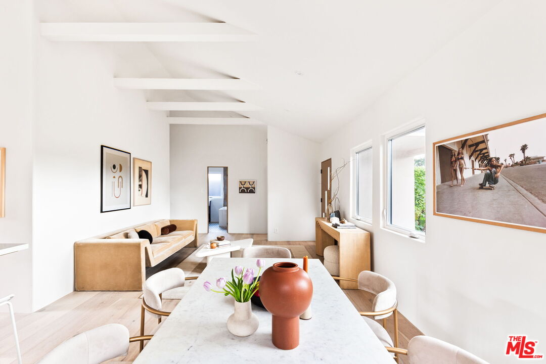 857 Rose Avenue Venice, CA 90291 - Photo 2 of 32 a living room with furniture and wooden floor