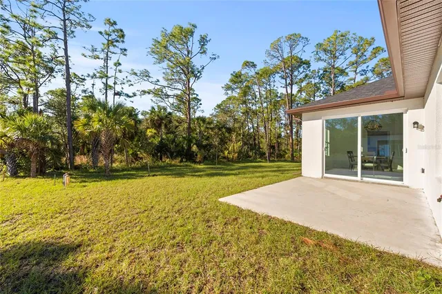 a view of pool and outdoor space