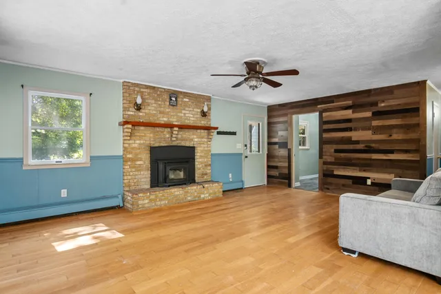 a view of a lake in middle of forest