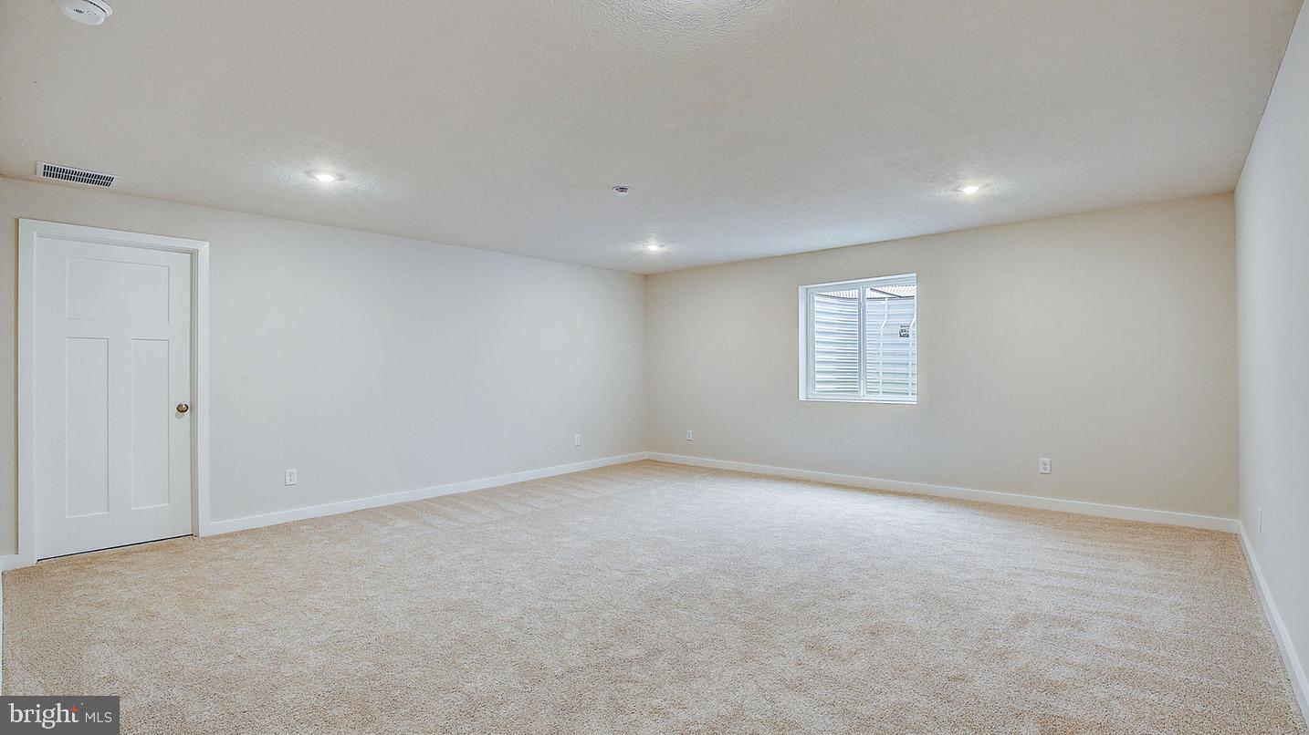 118 Erica Lane Columbia, PA 17512 - Photo 8 of 9 a view of an empty room with a window