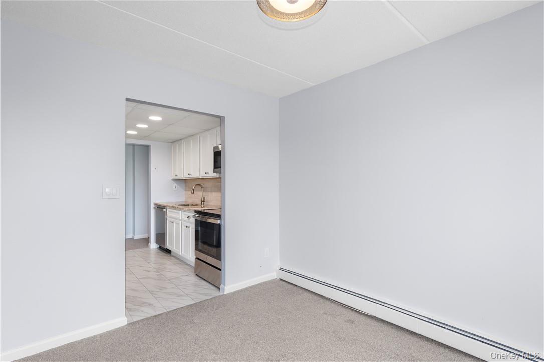 150 Overlook Avenue, Unit 1S Peekskill, NY 10566 - Photo 14 of 23 a view of kitchen with sink and microwave
