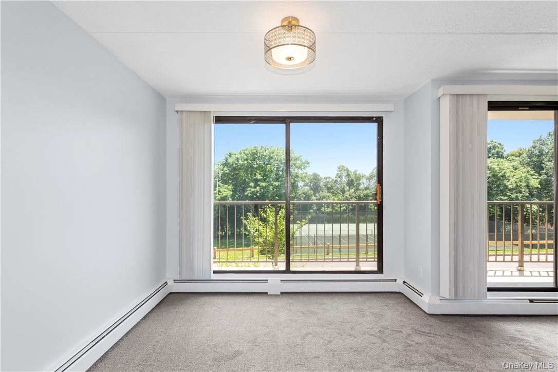 150 Overlook Avenue, Unit 1S Peekskill, NY 10566 - Photo 15 of 23 an empty room with a window