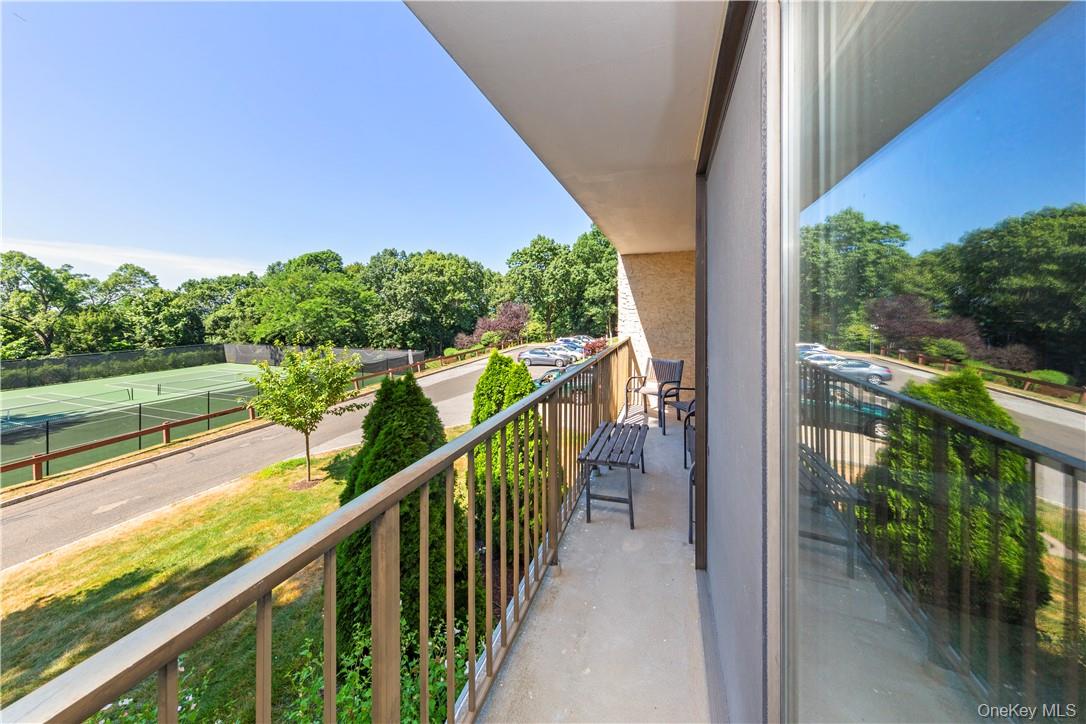 150 Overlook Avenue, Unit 1S Peekskill, NY 10566 - Photo 18 of 23 a view of a balcony with chairs