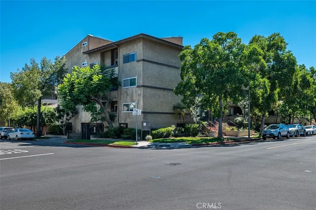 a view of road with a building in the background
