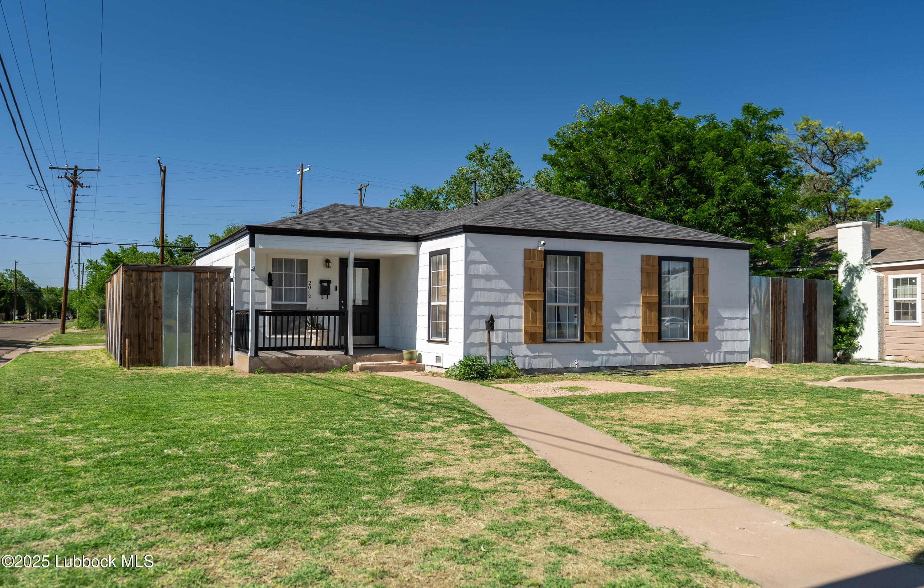 2012 29th Street Lubbock, TX 79411 - Photo 2 of 27 a view of a house with a backyard