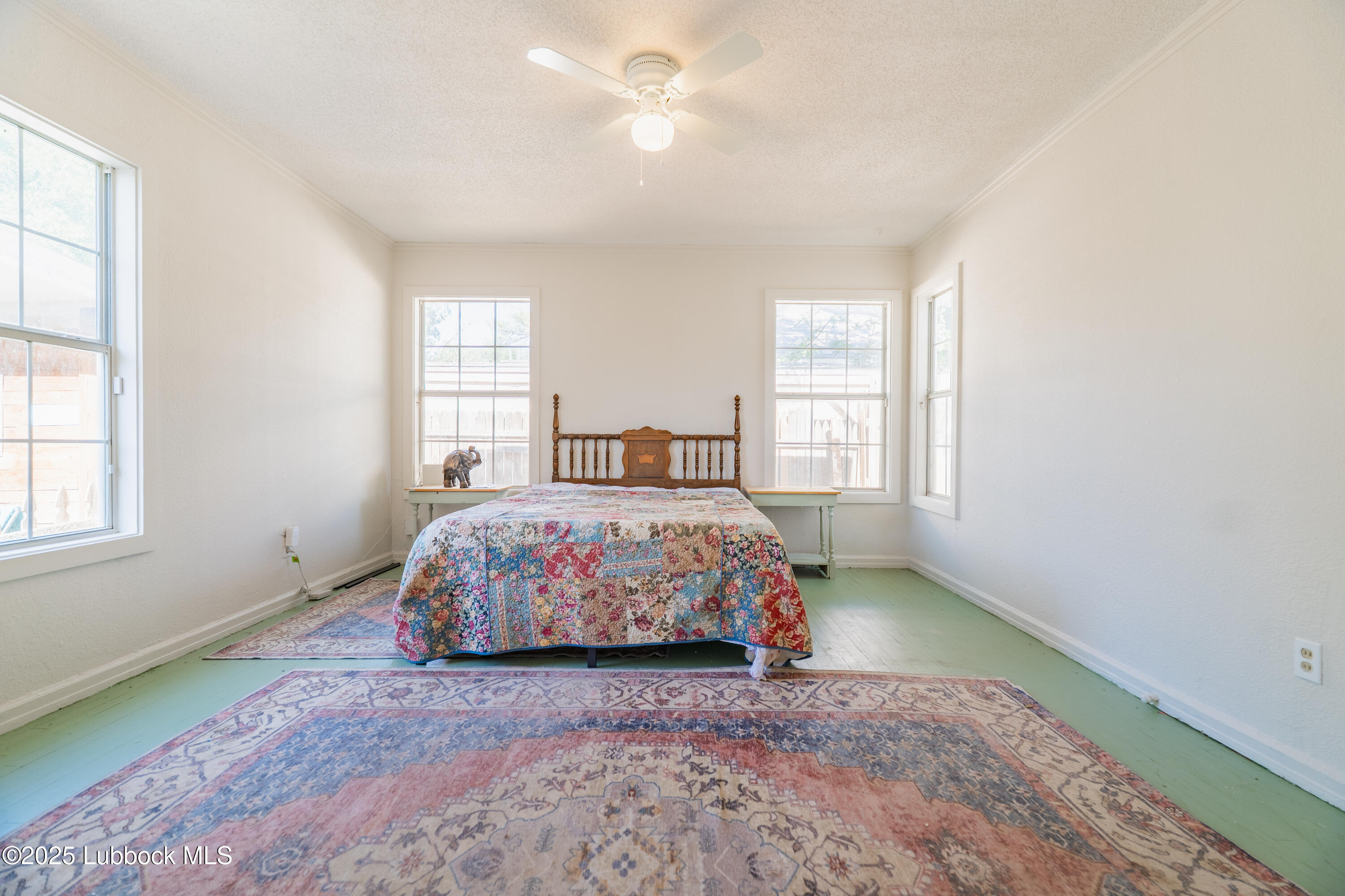 2012 29th Street Lubbock, TX 79411 - Photo 22 of 27 a bedroom with a bed and a window
