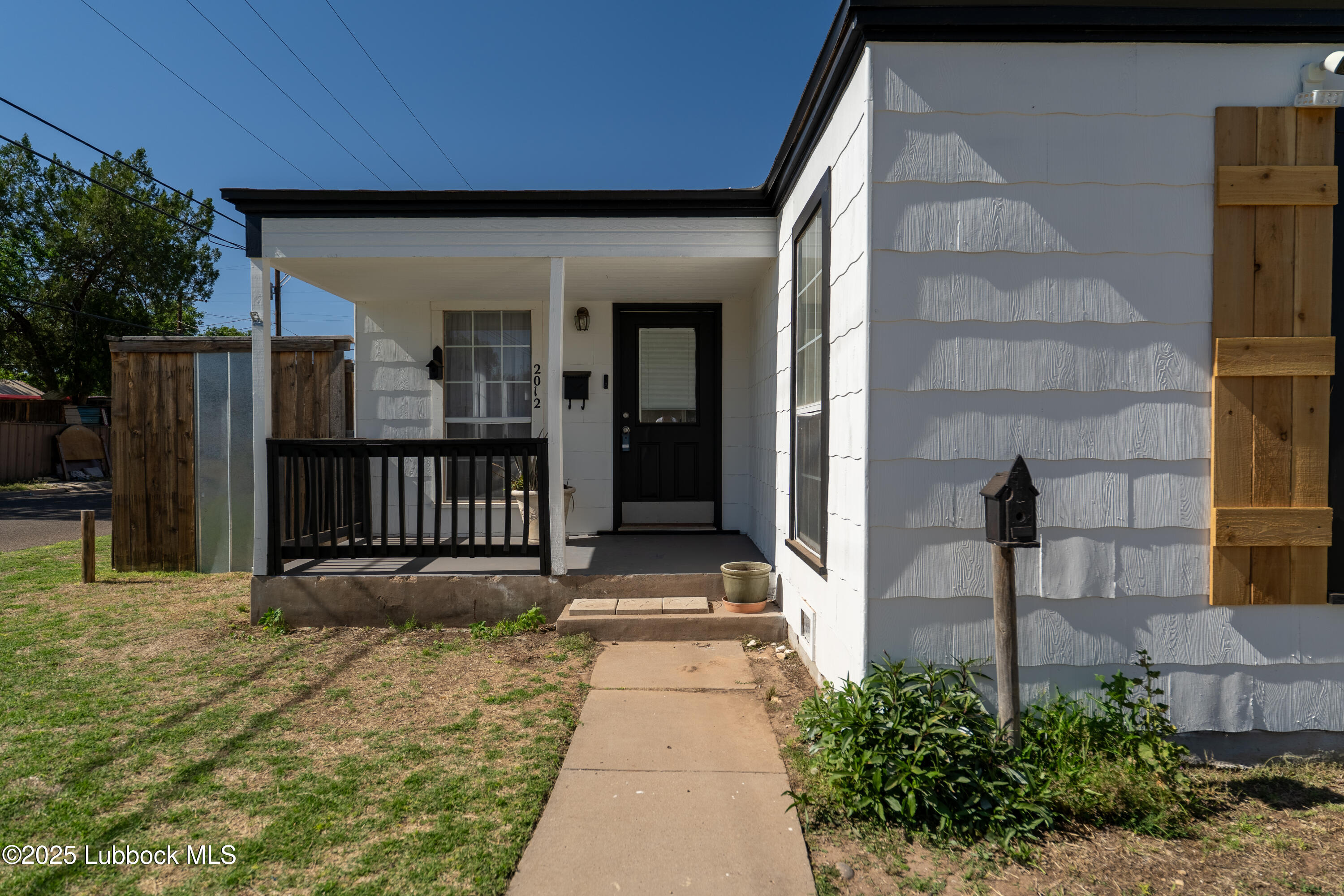 2012 29th Street Lubbock, TX 79411 - Photo 8 of 27 a view of a house with a porch