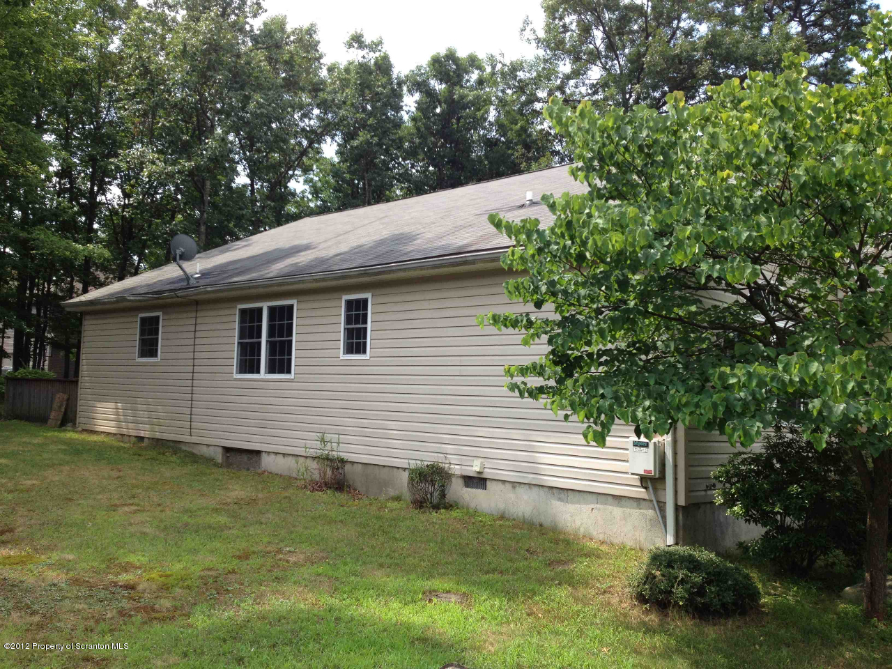 130 Gandolf Road Bushkill, PA 18324 - Photo 2 of 13 a backyard of a house with lots of green space