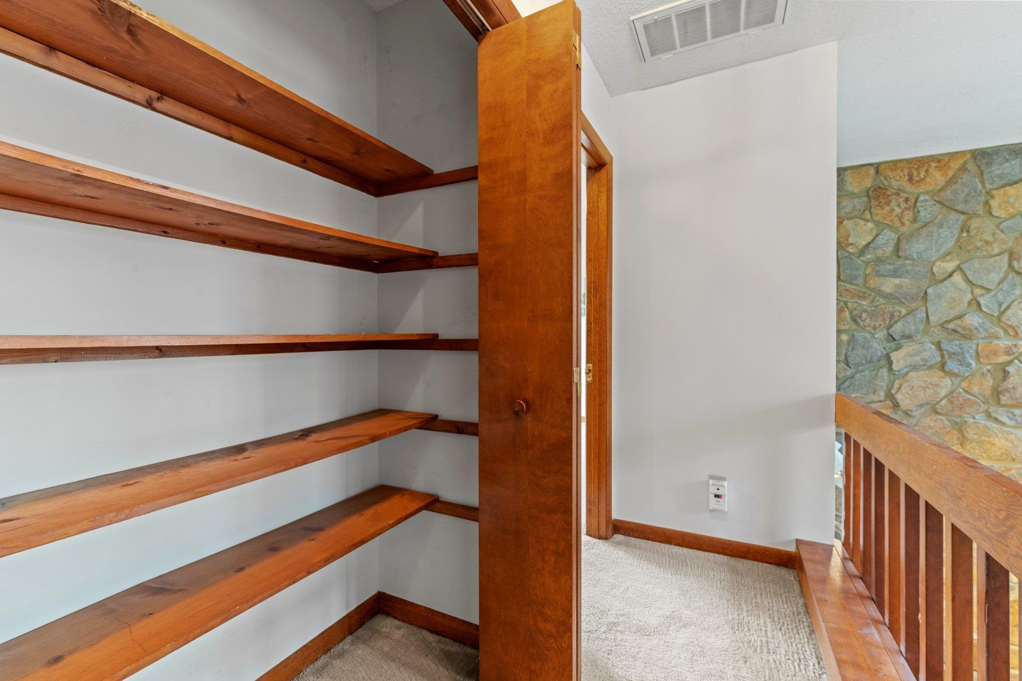 7829 Breckon Way Raleigh, NC 27615 - Photo 24 of 40 Extra storage space in hallway linen closet. Hallway Linen Closet