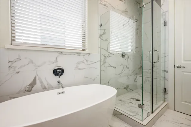 a bathroom with a sink and a shower