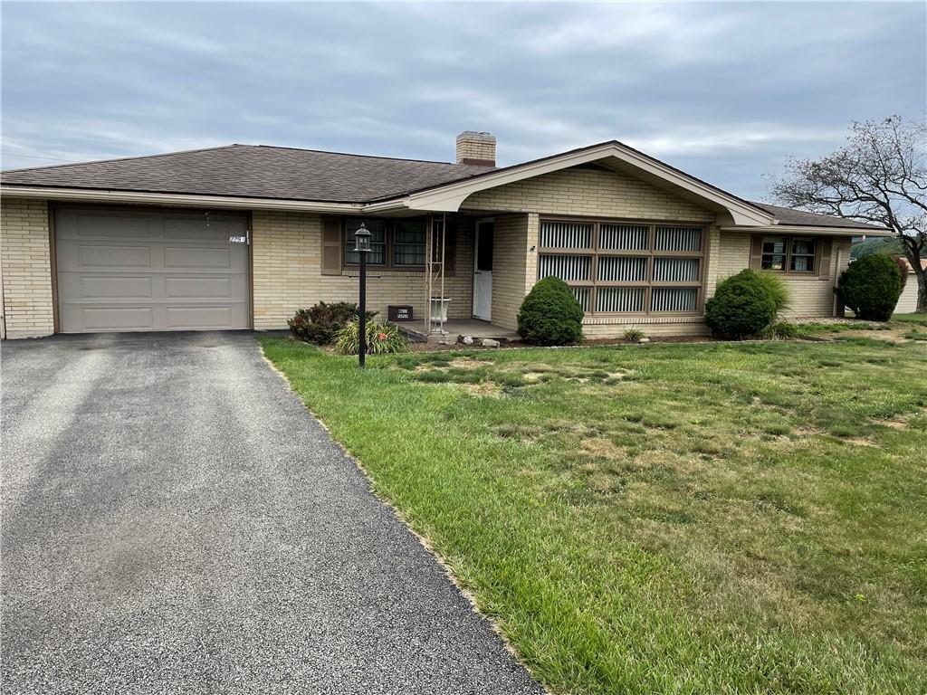 2253 Lazor Street Indiana, PA 15701 - Photo 2 of 24 a front view of a house with a yard