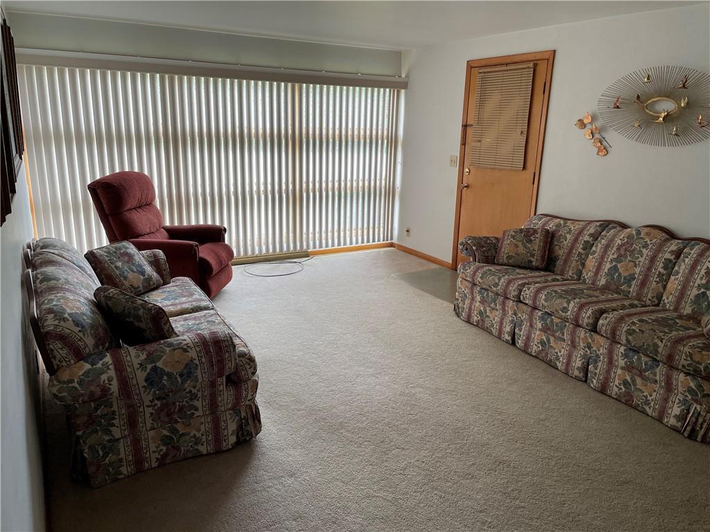 2253 Lazor Street Indiana, PA 15701 - Photo 4 of 24 a couch sitting in a living room next to a window