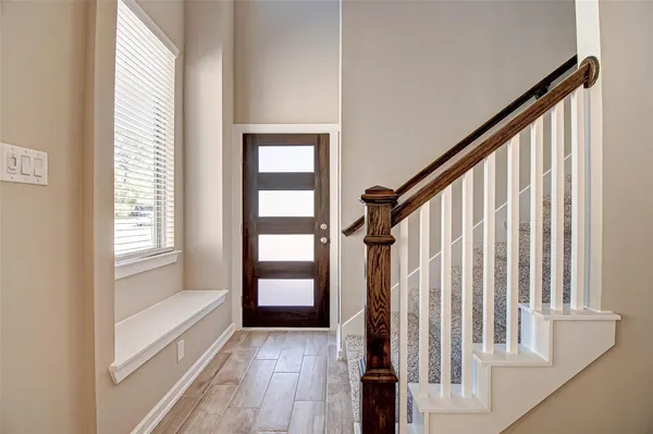a view of an entryway with staircase