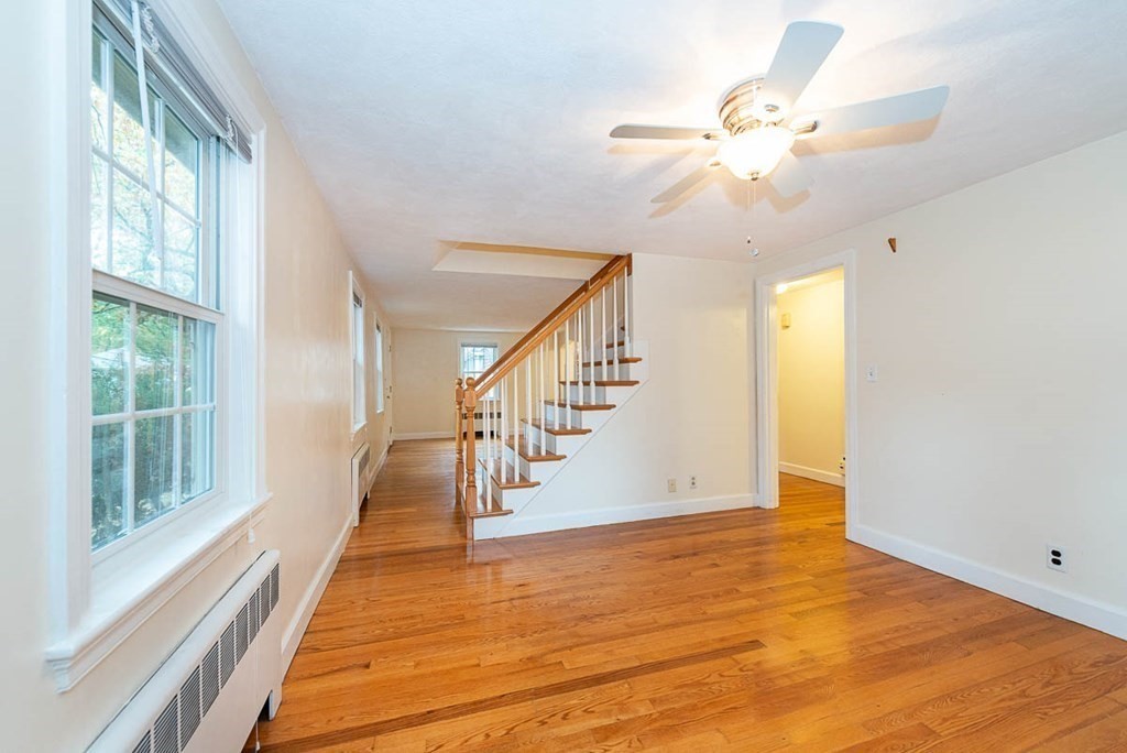 62 Spring Street Lexington, MA 02421 - Photo 12 of 32 a view of an entryway with wooden floor