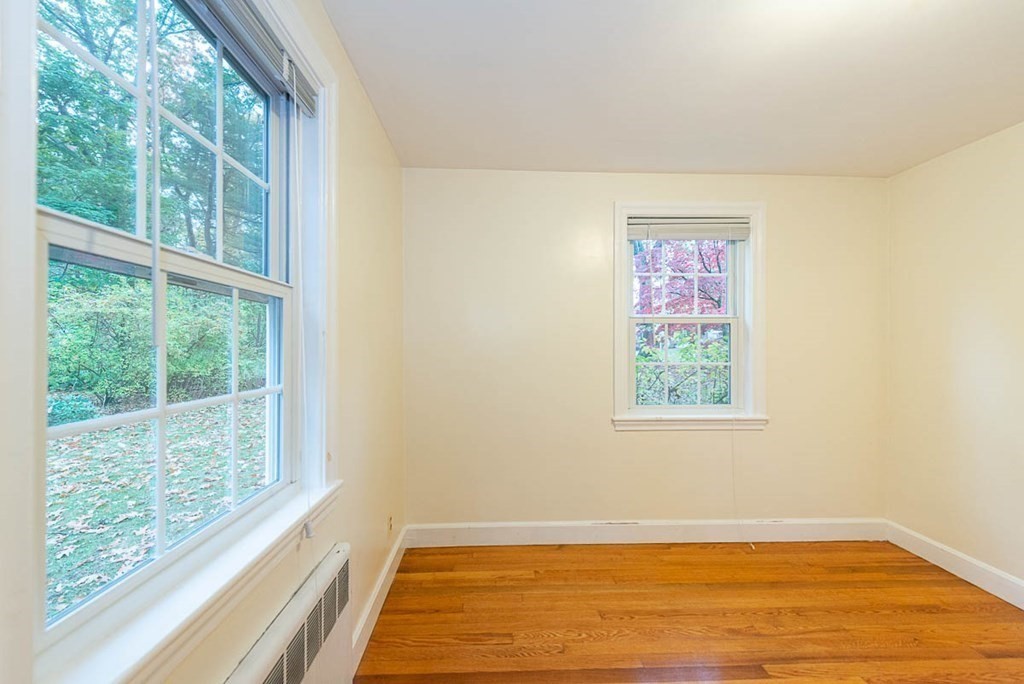 62 Spring Street Lexington, MA 02421 - Photo 19 of 32 an empty room with a window