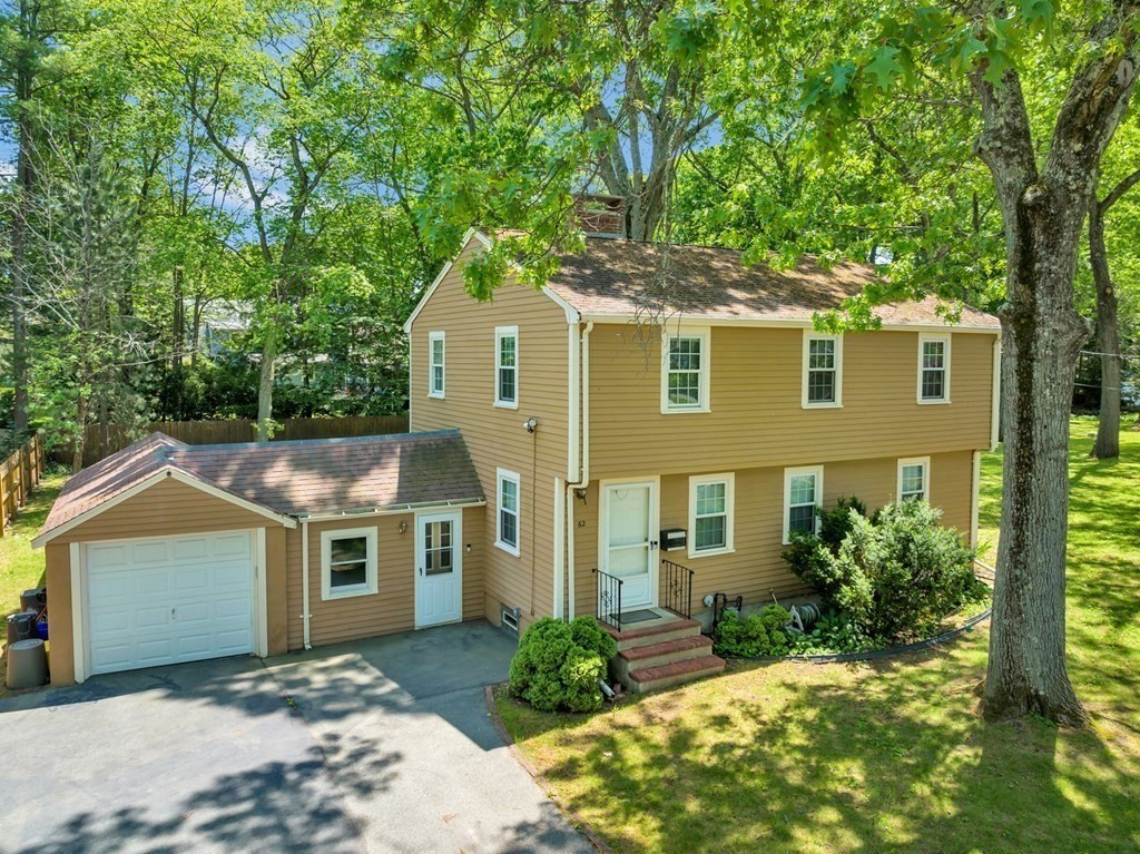 62 Spring Street Lexington, MA 02421 - Photo 3 of 32 front view of a house with a yard