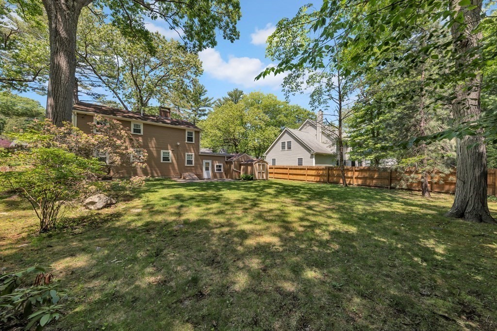 62 Spring Street Lexington, MA 02421 - Photo 32 of 32 a front view of a house with garden