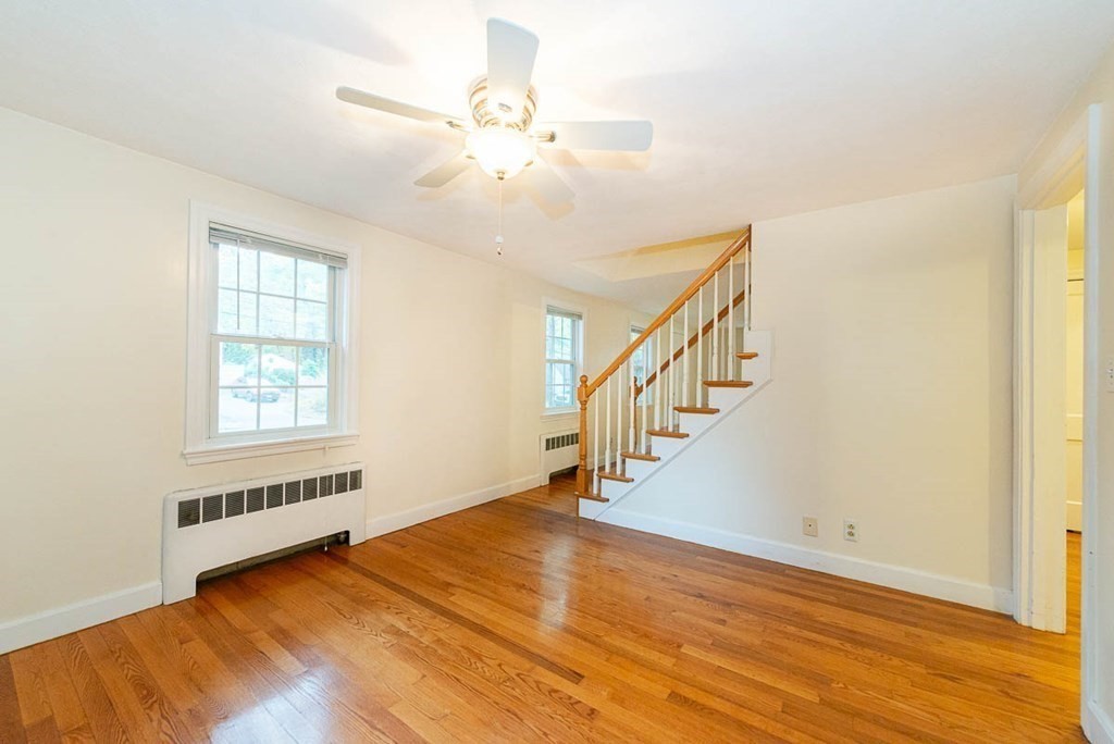 62 Spring Street Lexington, MA 02421 - Photo 10 of 32 a view of an entryway with wooden floor