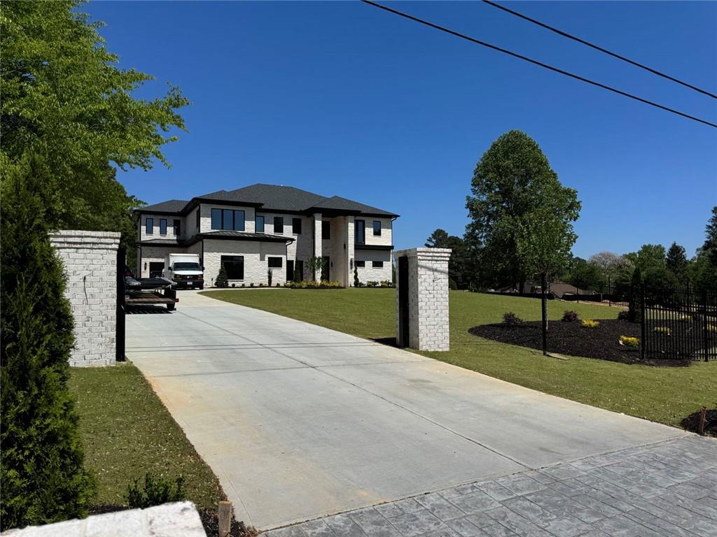 3425 Thompson Mill Road Buford, GA 30519 - Photo 3 of 48