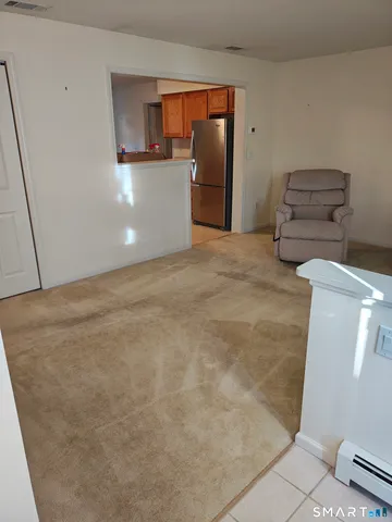 a view of a closet in kitchen