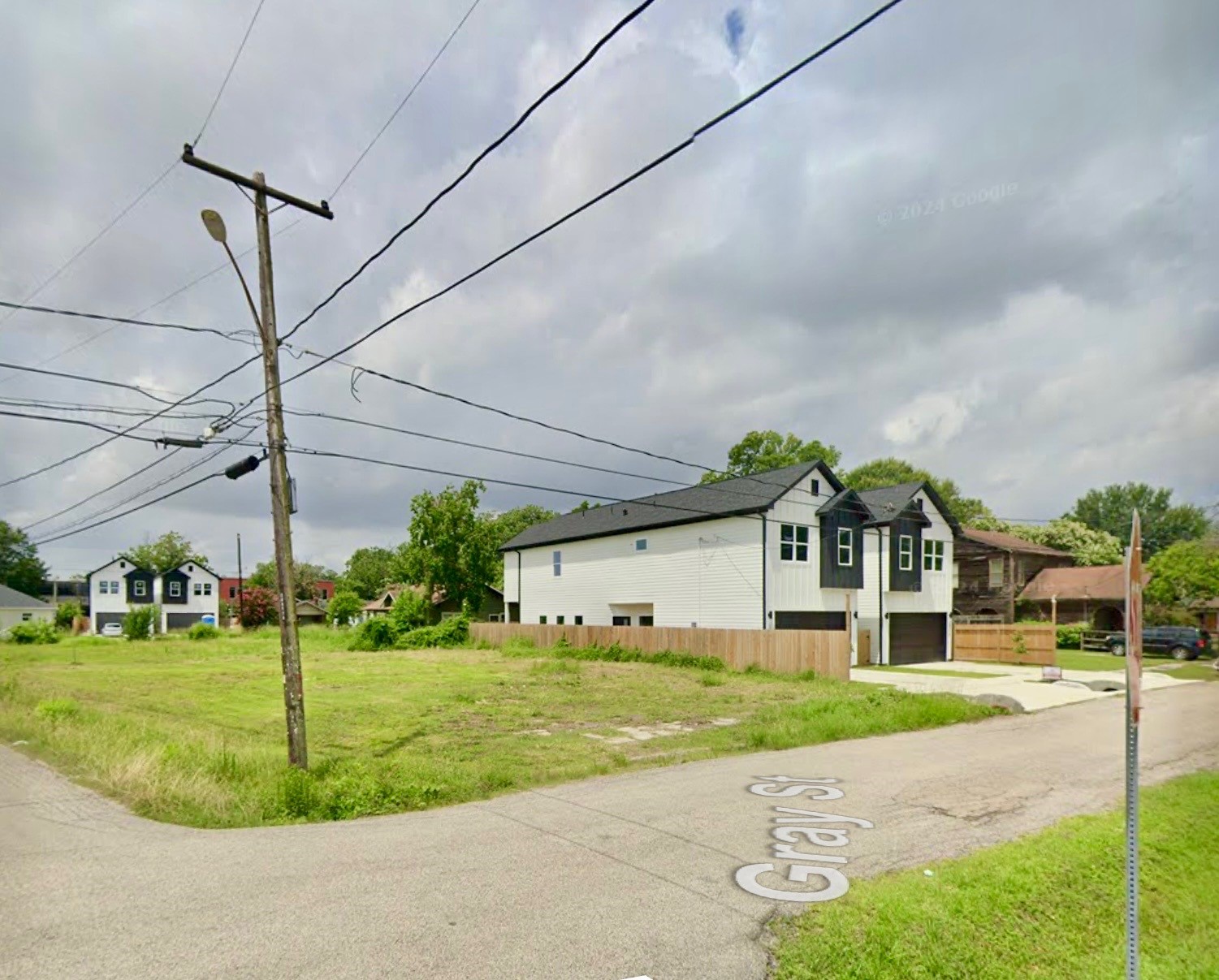 3110 Gray Street Houston, TX 77004 - Photo 5 of 14 a front view of a house with a yard