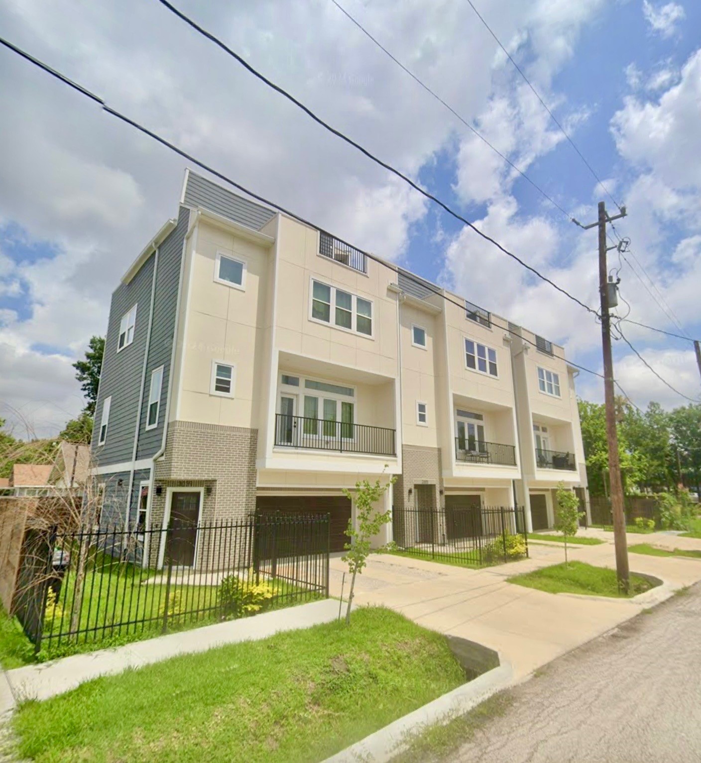 3110 Gray Street Houston, TX 77004 - Photo 6 of 14 a view of a big house with a fountain and a yard