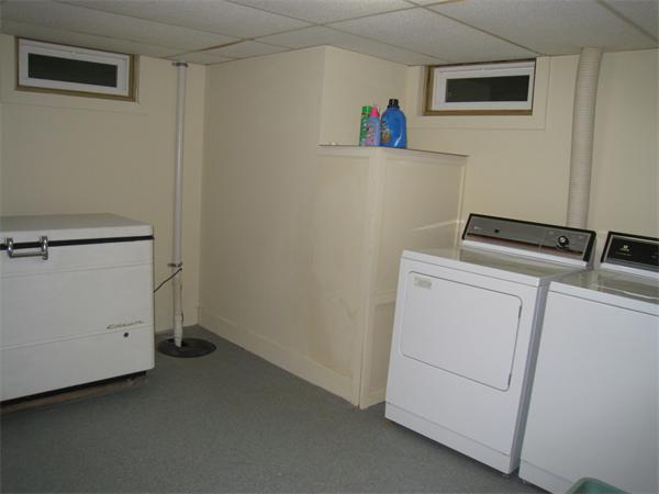 233 South Meadow Road Lancaster, MA 01523 - Photo 16 of 21 a utility room with dryer and washer