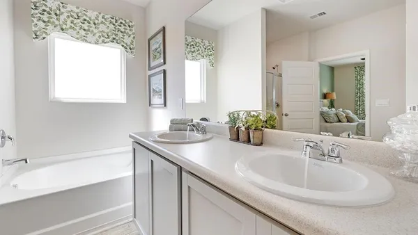 a bathroom with a sink and a bathtub