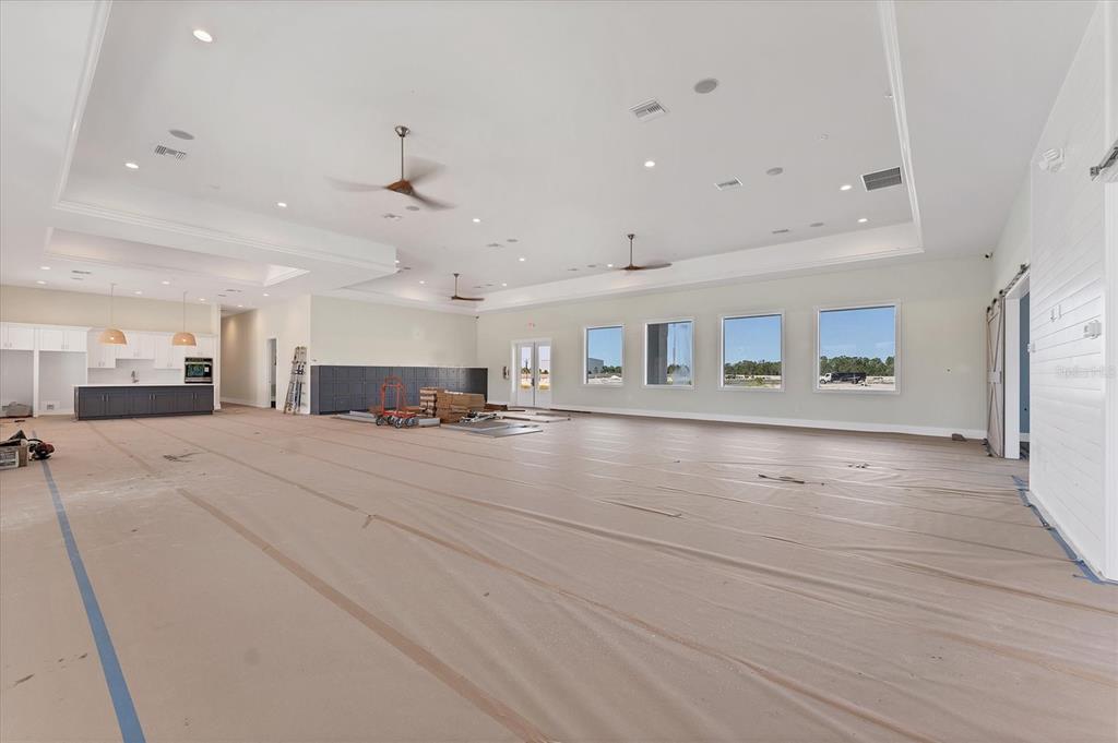 9001 Gasparilla Road, Unit 6 Rotonda West, FL 33947 - Photo 27 of 79 a view of a kitchen with a sink and a refrigerator