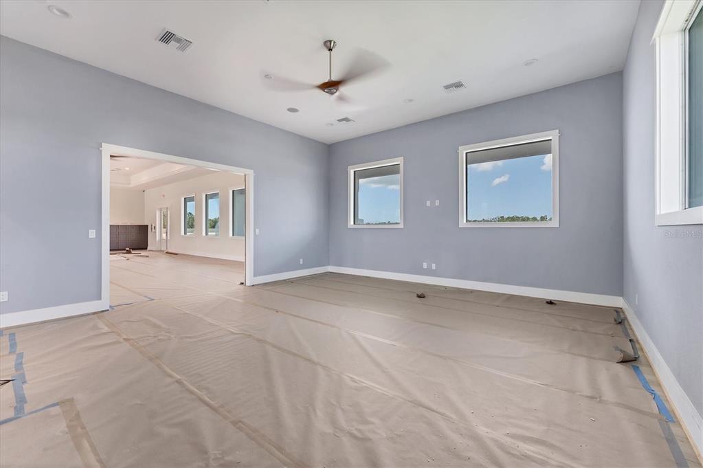 9001 Gasparilla Road, Unit 6 Rotonda West, FL 33947 - Photo 32 of 79 a view of an empty room with a window