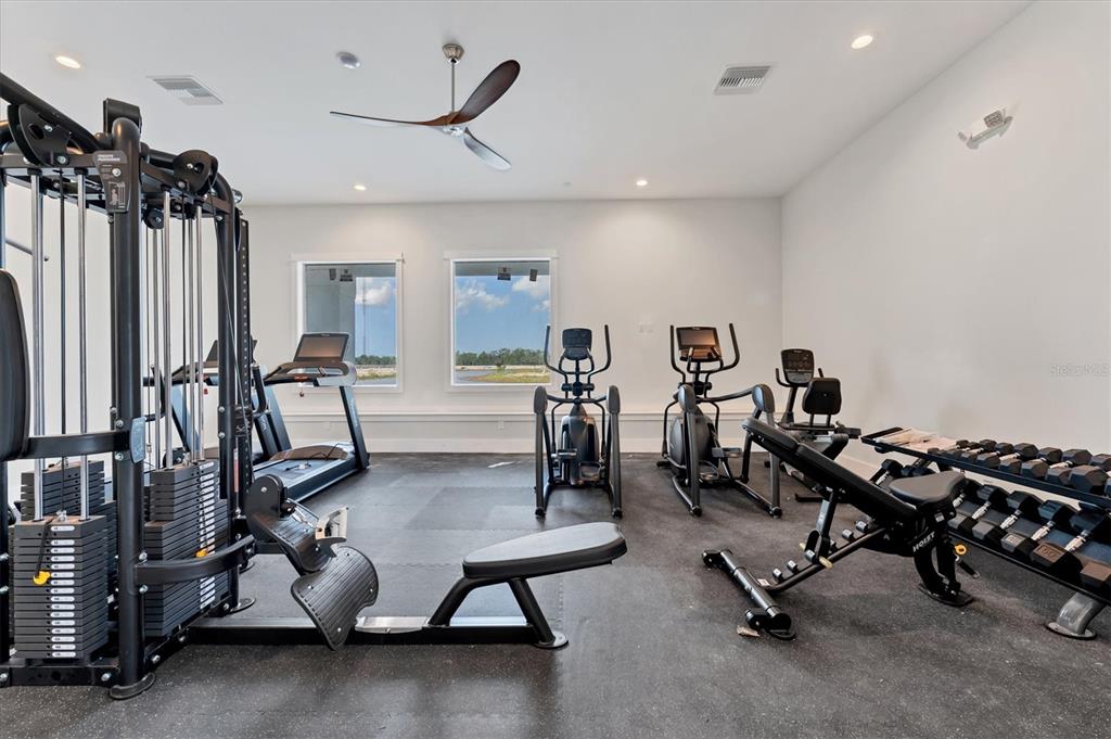 9001 Gasparilla Road, Unit 6 Rotonda West, FL 33947 - Photo 41 of 79 a view of a room with gym equipment