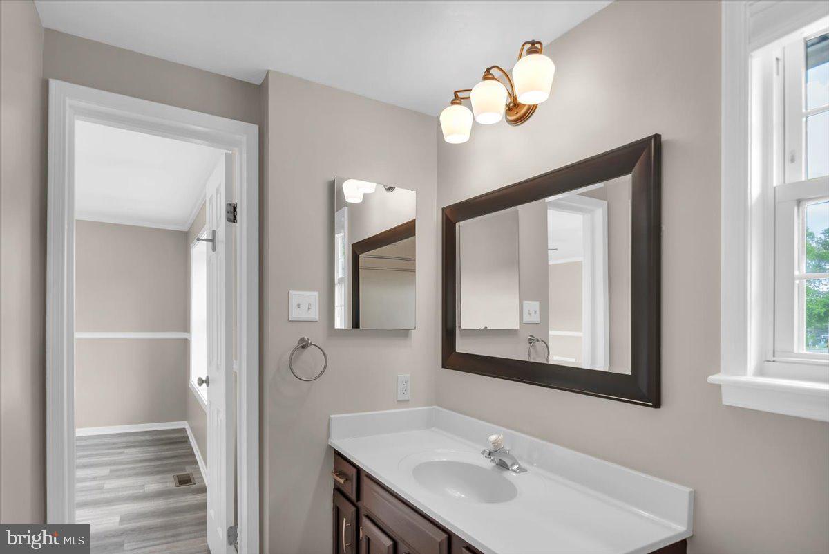518 Demoss Court Glassboro, NJ 08028 - Photo 15 of 29 a bathroom with a sink and a mirror