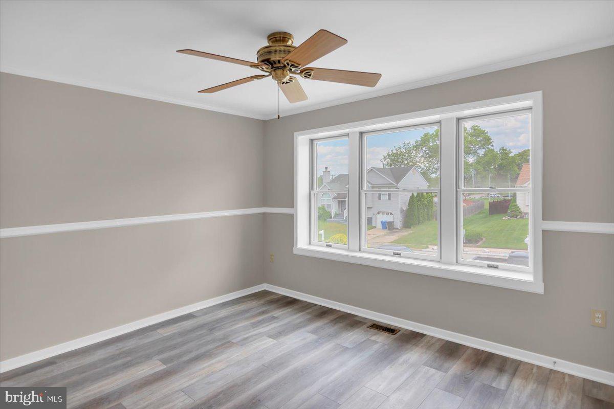 518 Demoss Court Glassboro, NJ 08028 - Photo 19 of 29 wooden floor in an empty room with a window