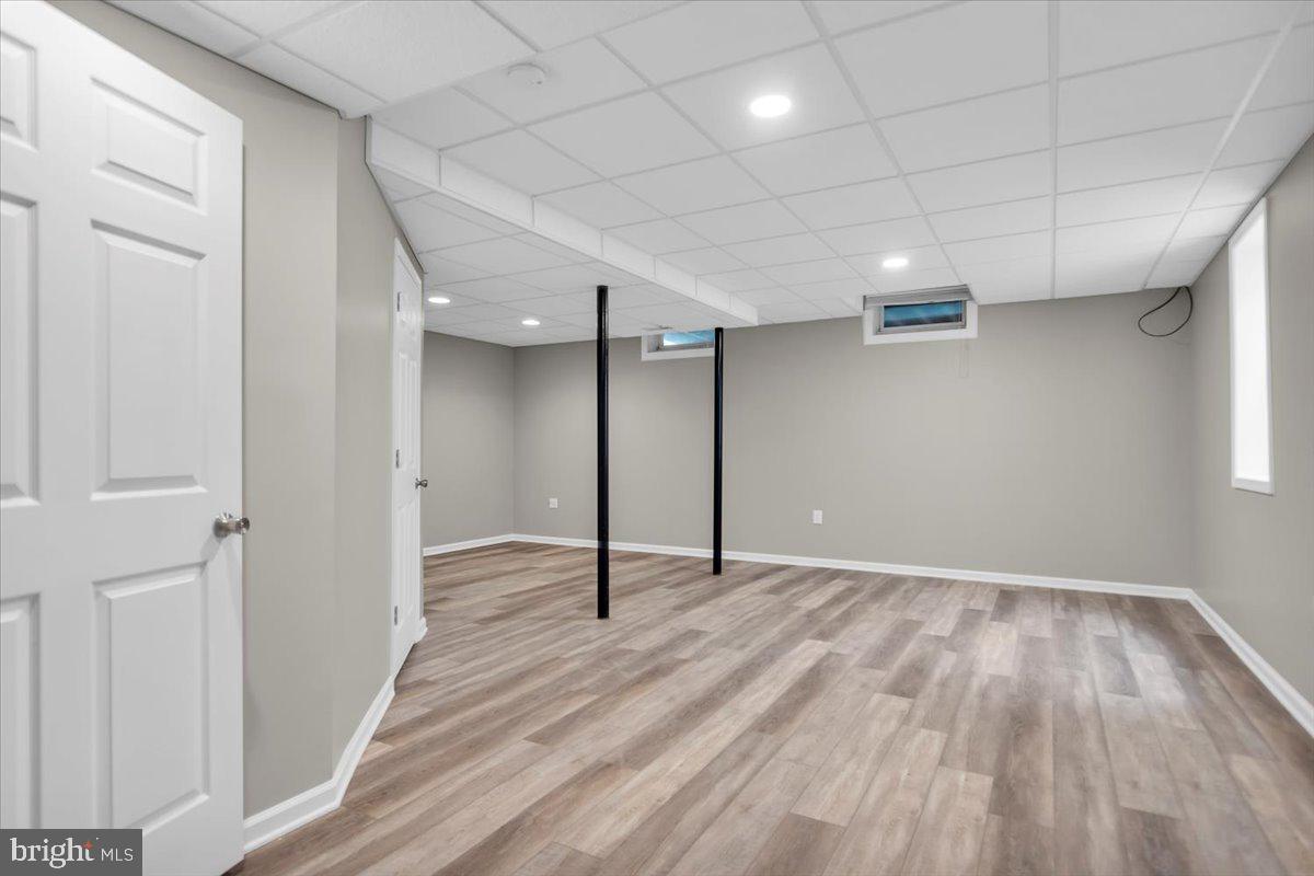 518 Demoss Court Glassboro, NJ 08028 - Photo 25 of 29 a view of an empty room with wooden floor