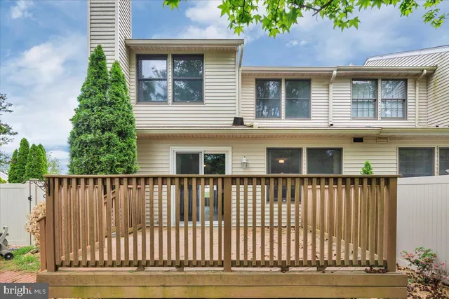 a front view of a house with a porch