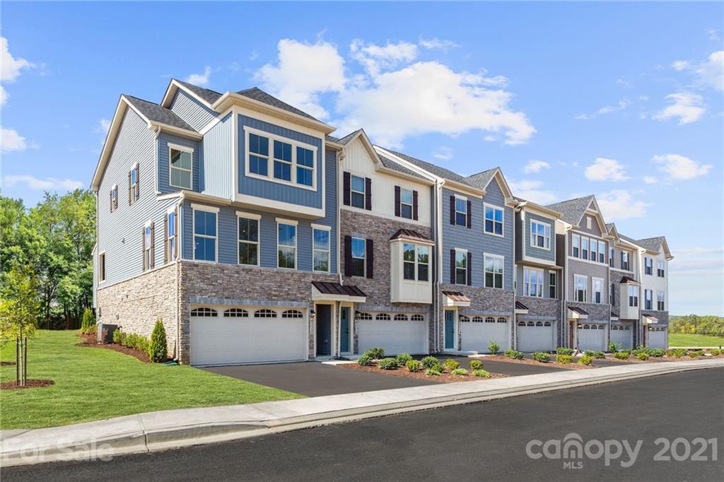 677 Crudent Road, Unit 1012E Tega Cay, SC 29708 - Photo 12 of 13 a front view of a building with street view