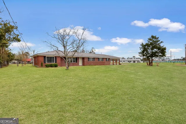 a front view of house with yard