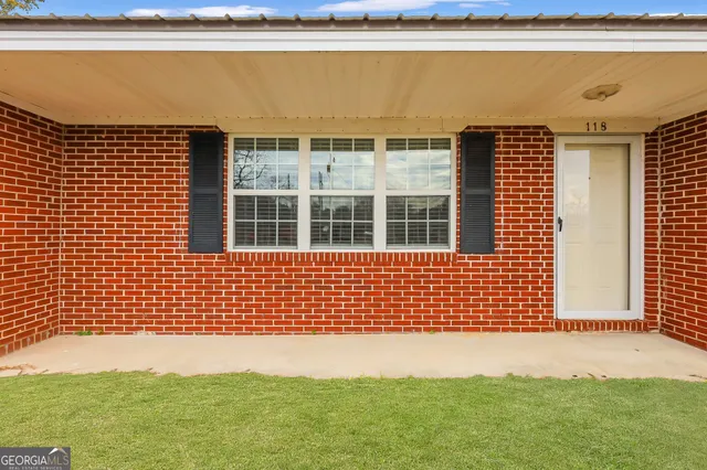 a view of a building from the balcony