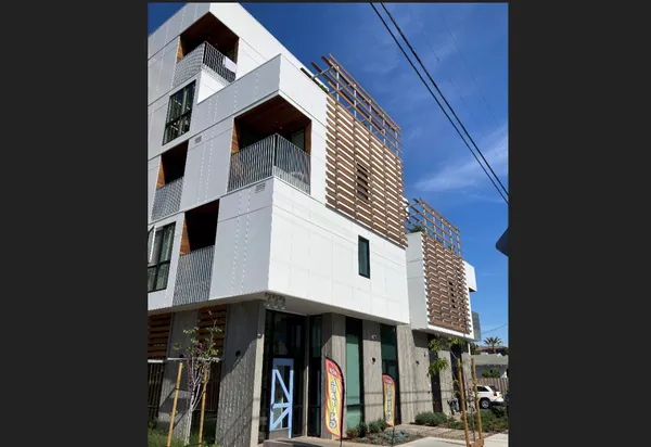a front view of a building with glass windows