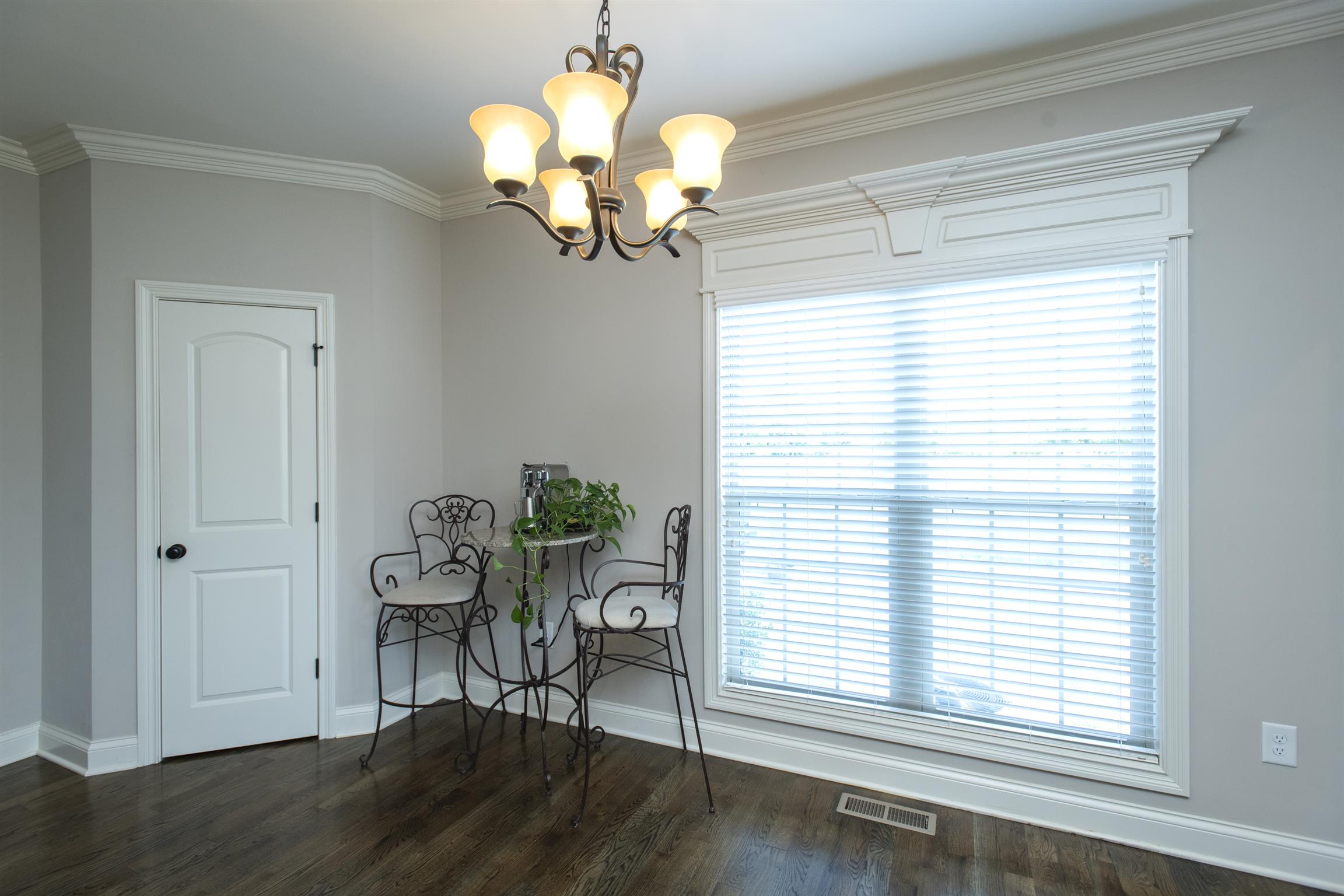 580 Academy Road Lebanon, TN 37087 - Photo 11 of 30 a view of a dining room with furniture wooden floor and chandelier