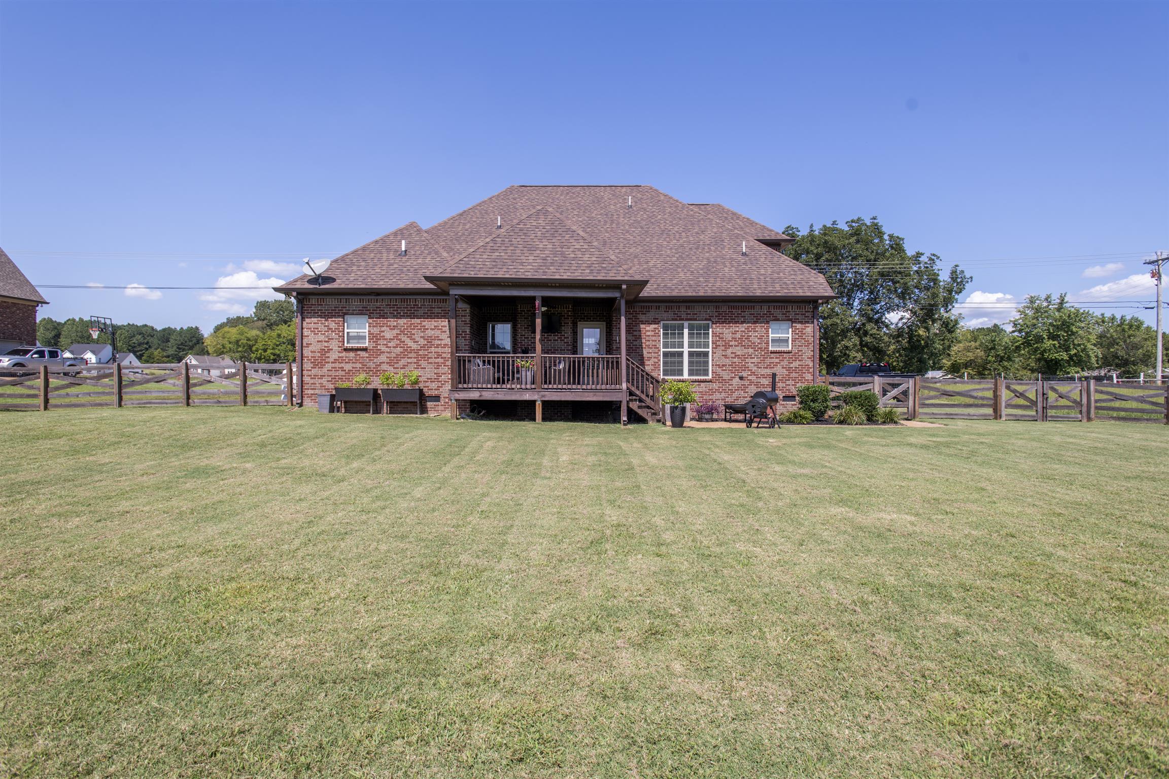 580 Academy Road Lebanon, TN 37087 - Photo 29 of 30 a view of a house with a big yard and large tree